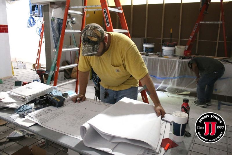 Man Looking At A Blueprint — Killeen, TX — CWS Services