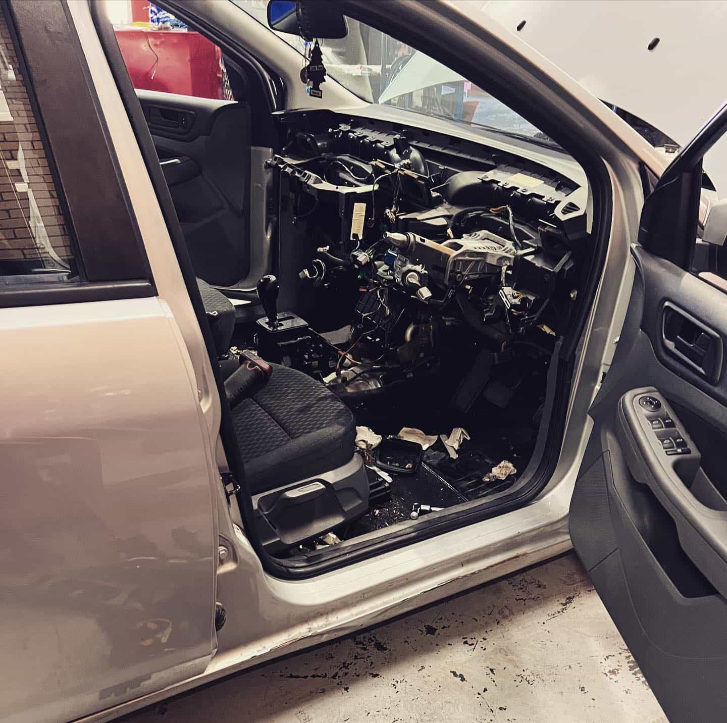 Silver Car with the Dashboard Removed — Certified Mechanic in Canberra, ACT