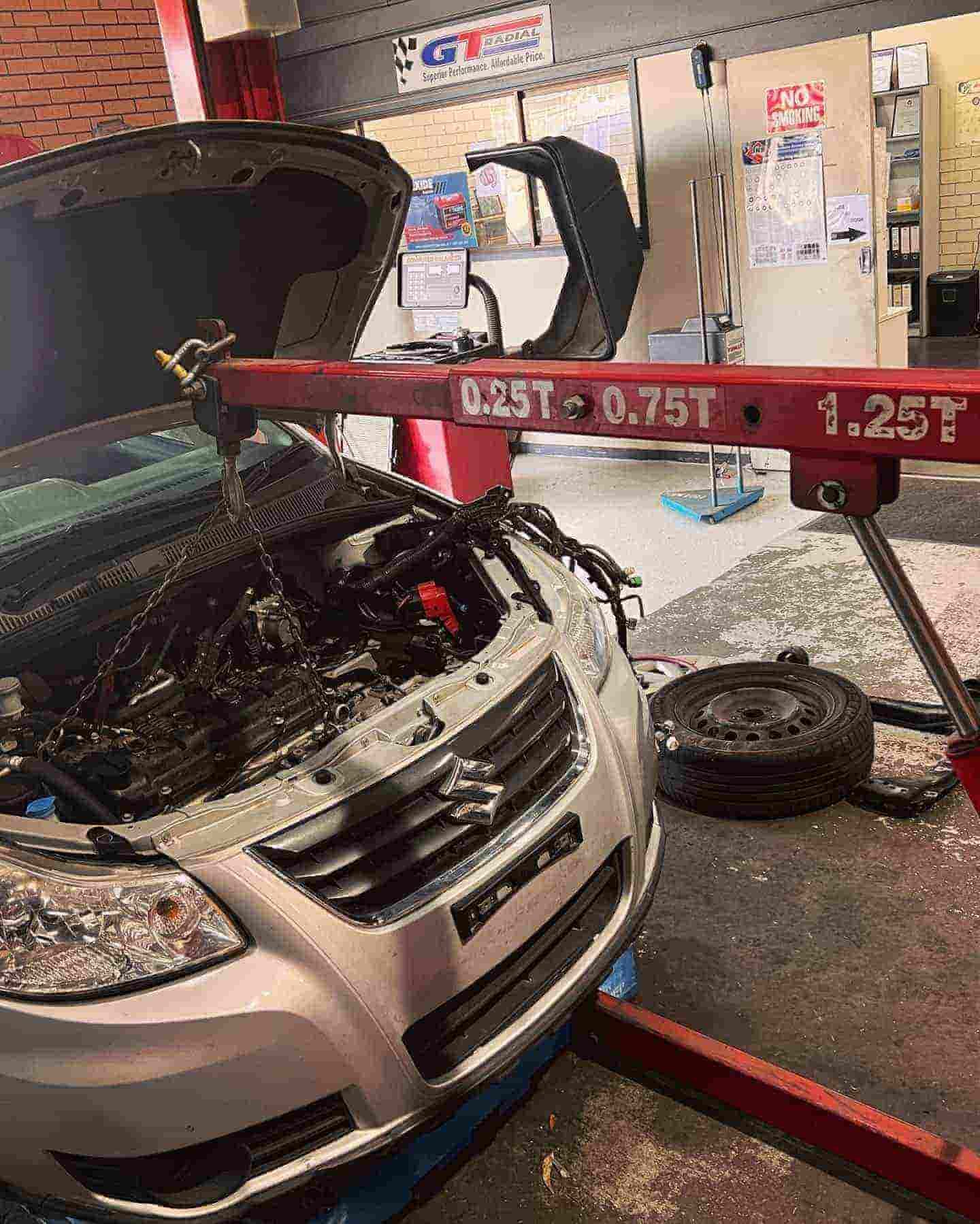 Silver Car with the Hood Up —Certified Mechanic in Canberra, ACT