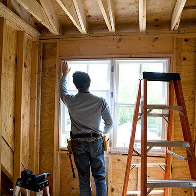 Contractor Working on Window — Huntsville, AL — In-Design Woodworks
