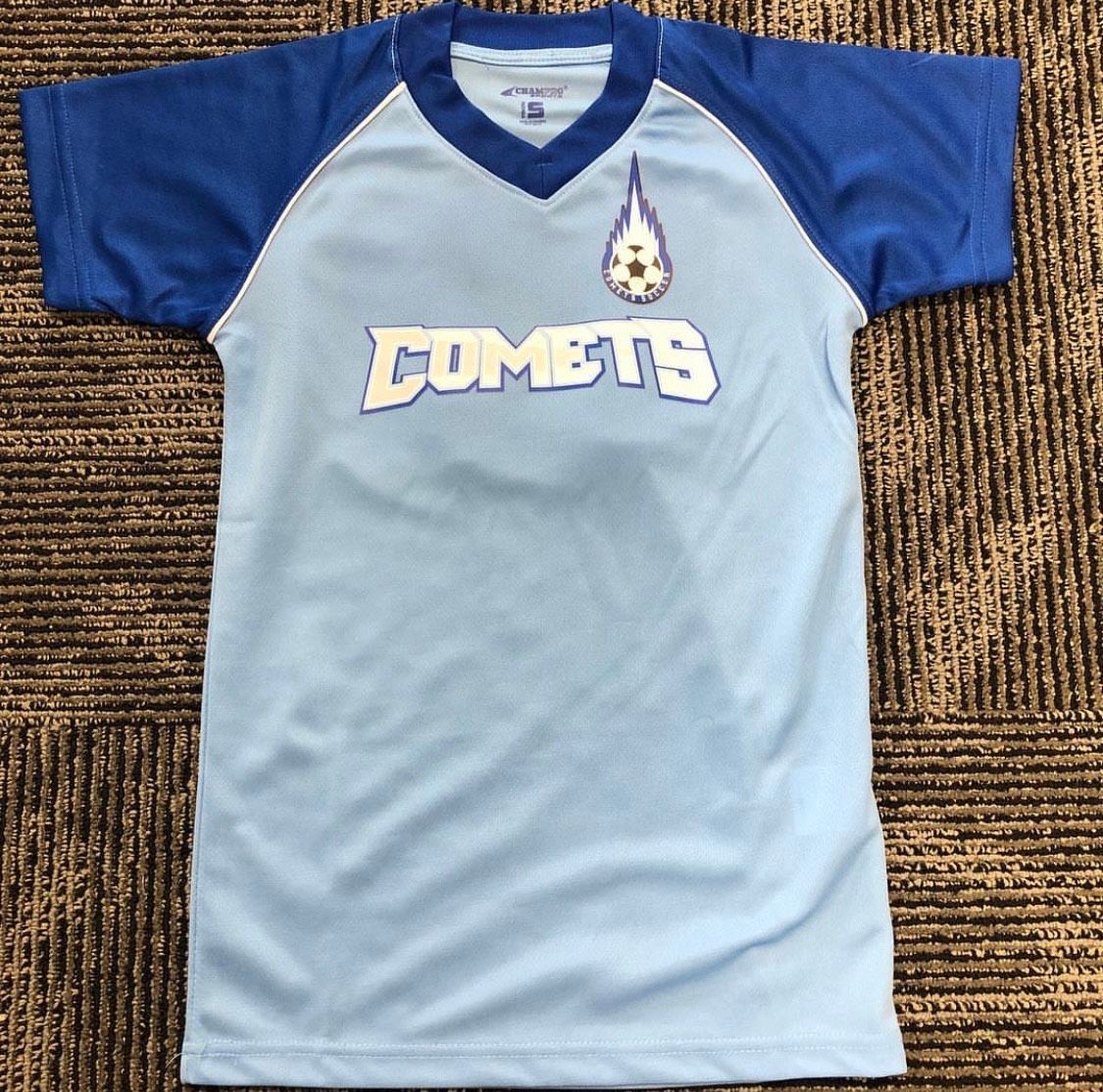 Light blue and royal blue soccer jersey