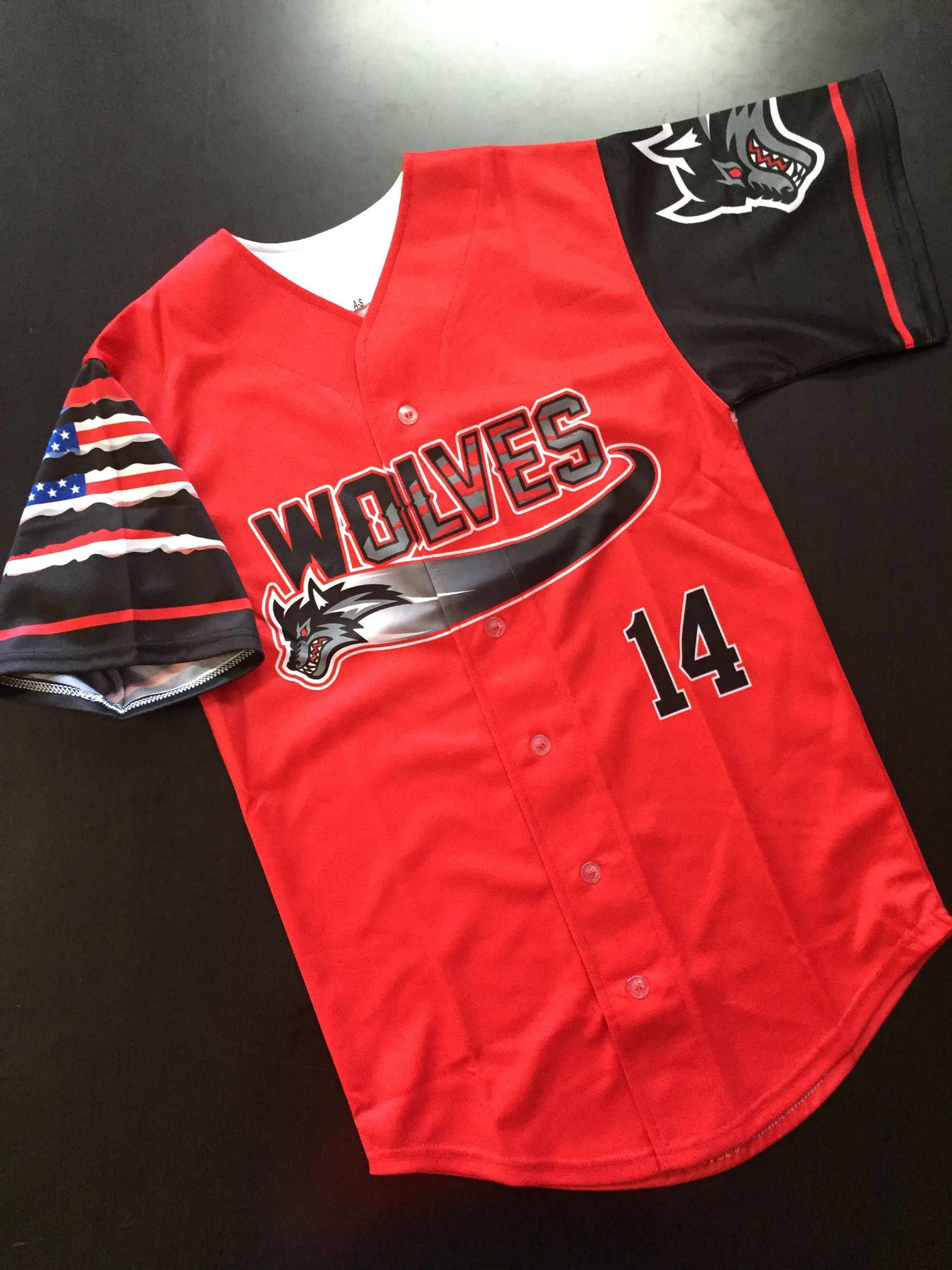 Red Wolves baseball jersey with black sleeves, the number 14, and wolf graphics.