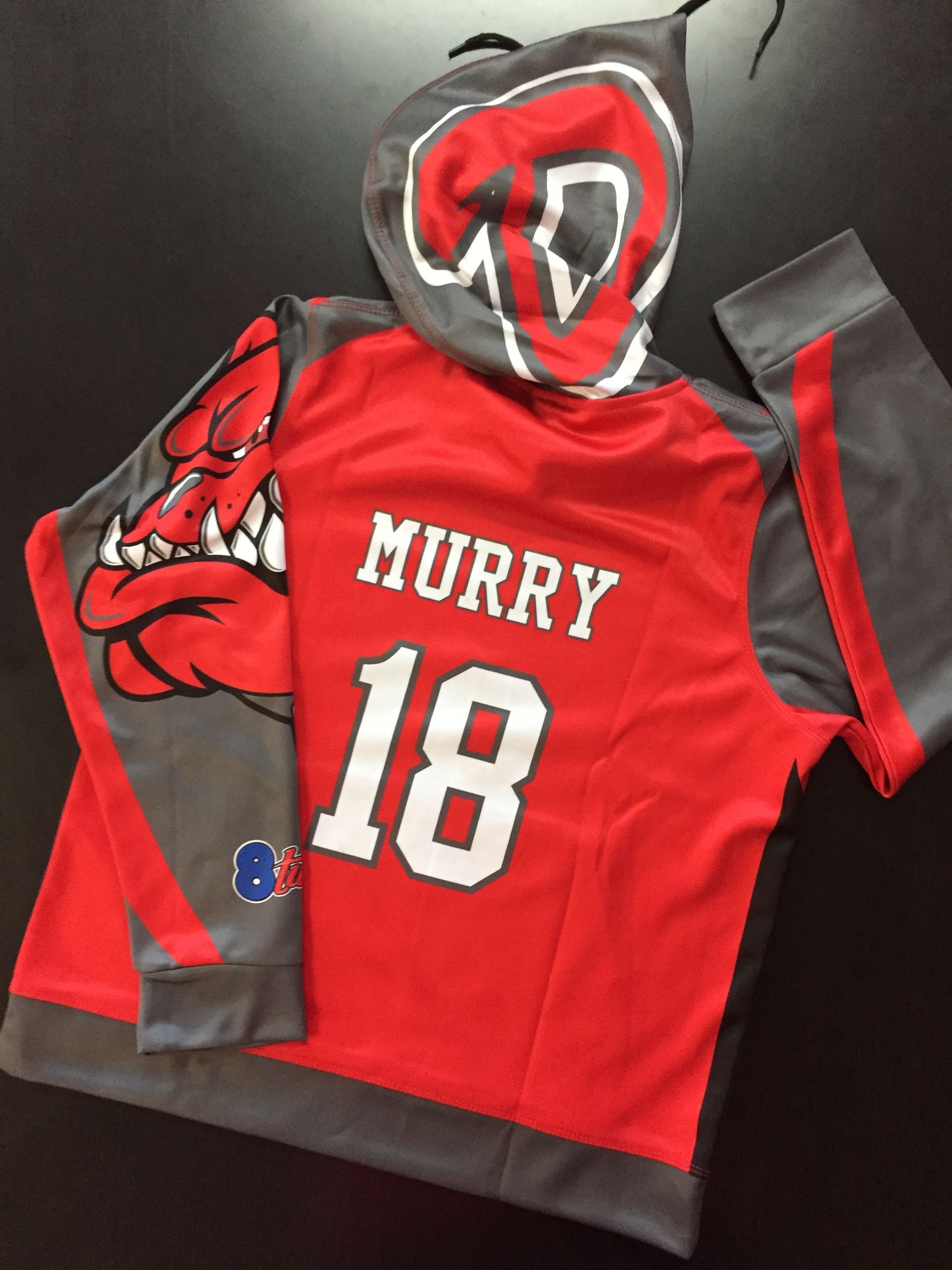 Red and gray hooded sweatshirt with a bulldog on the sleeve 