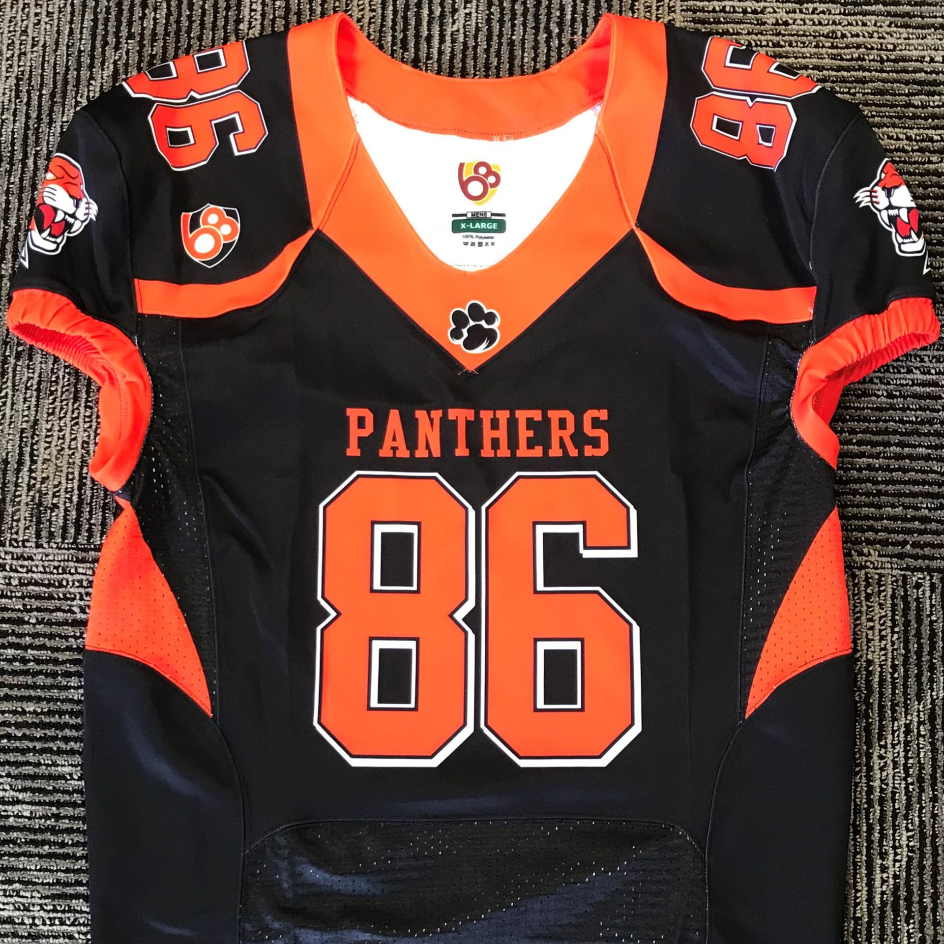black and orange football jersey