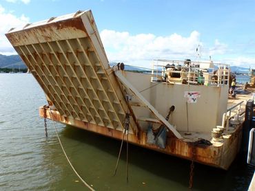 A large boat is docked in a body of water — Marine Surveying in Cairns, QLD