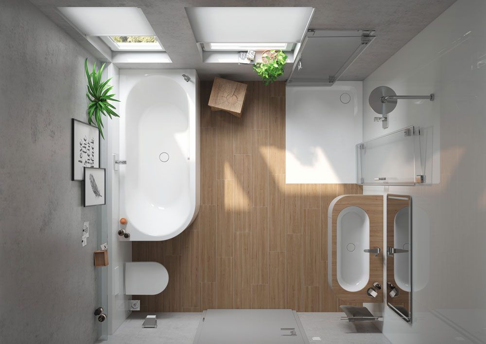 Vista dall'alto di un bagno moderno con vasca, doccia e WC, caratterizzato da legno chiaro e sanitari bianchi.