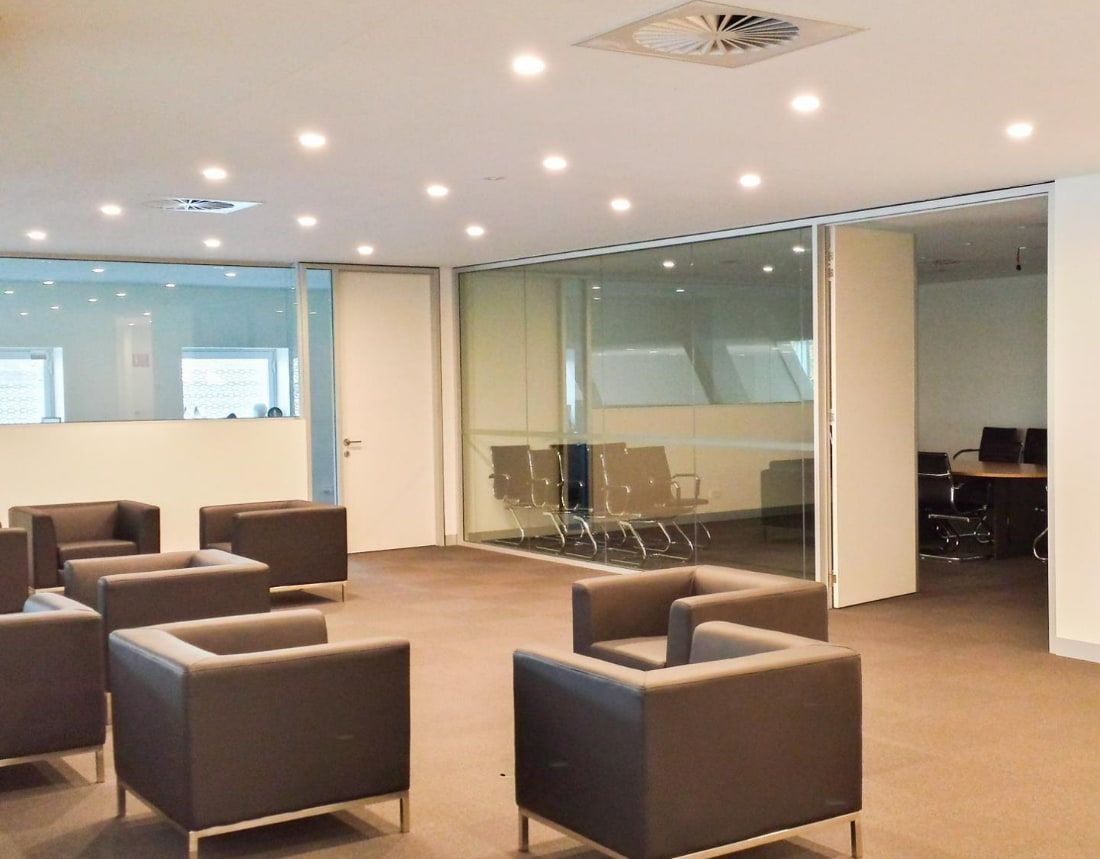 A Room With a Lot of Chairs and a Glass Wall — D & J Saverino Painting & Decorating Pty Ltd In Fairy Meadow, NSW