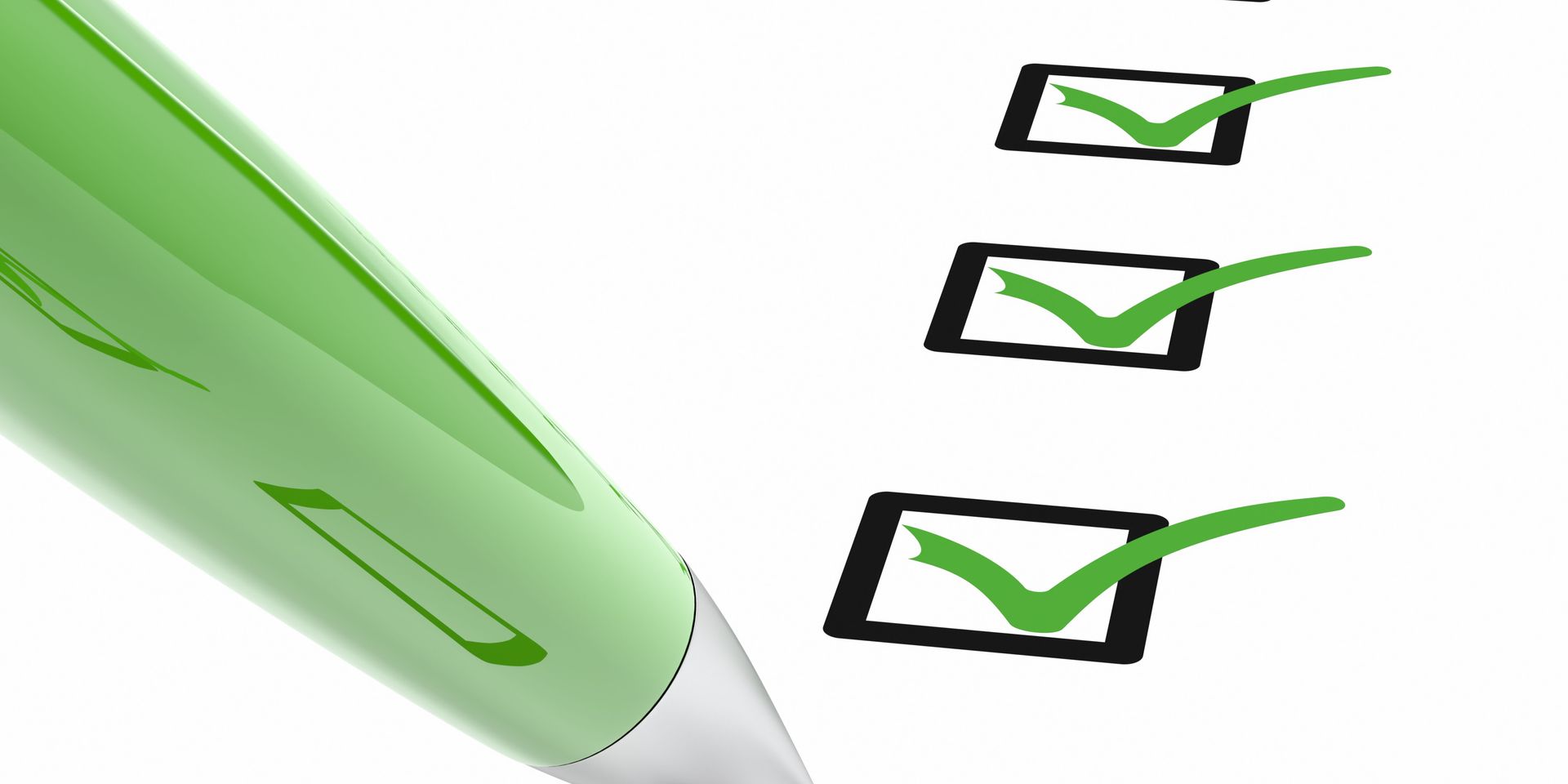 A green pen is next to a checklist with three green check marks