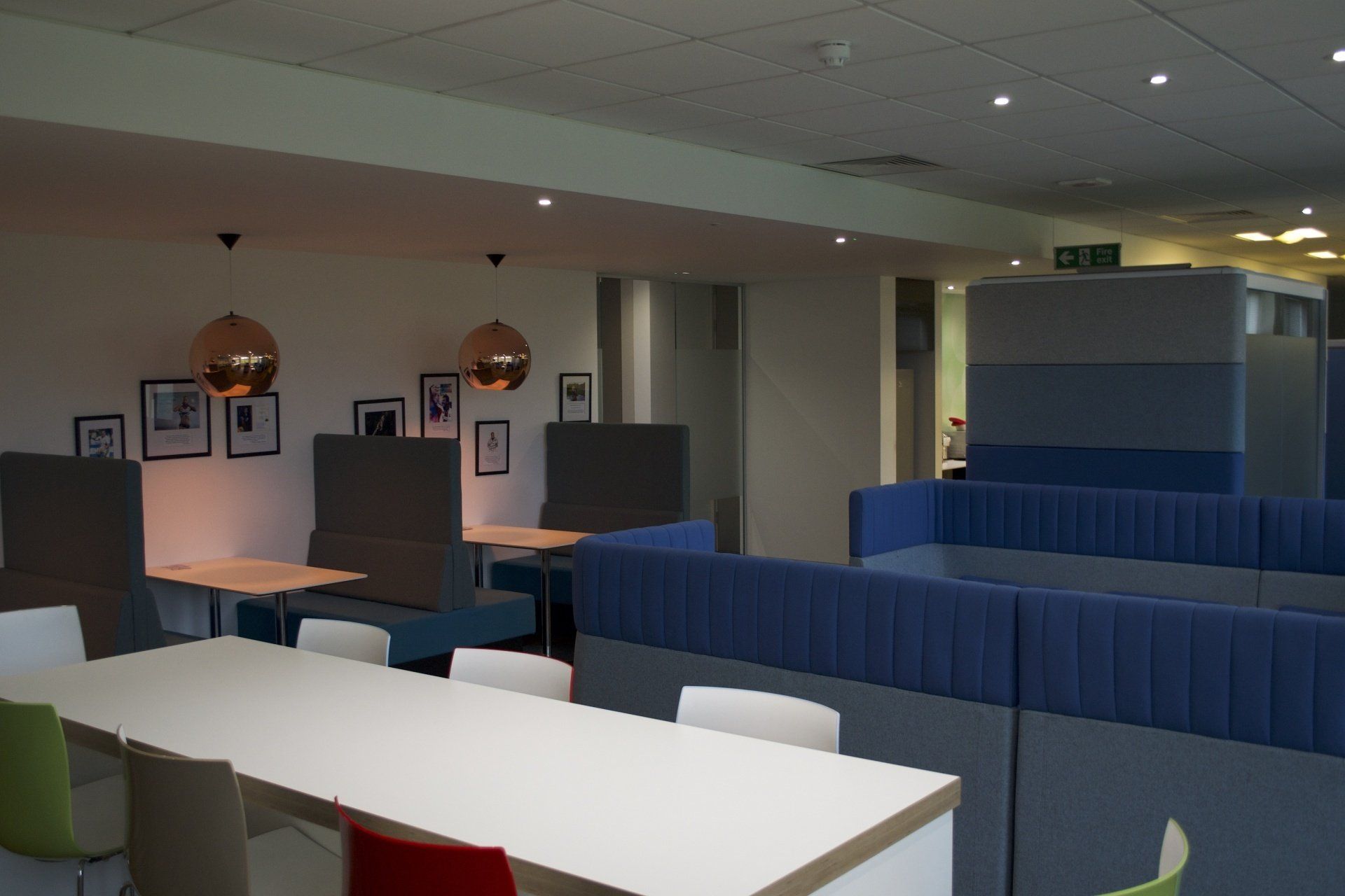 A room with tables and chairs in it