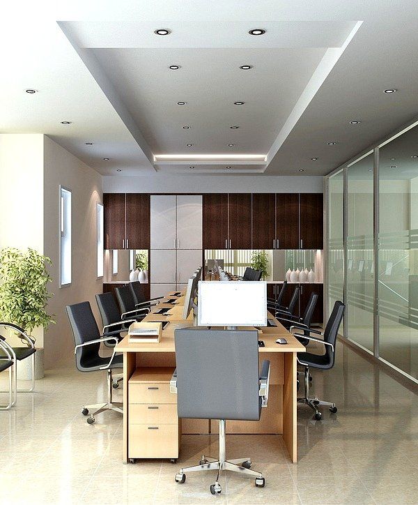 A conference room with a long table and chairs