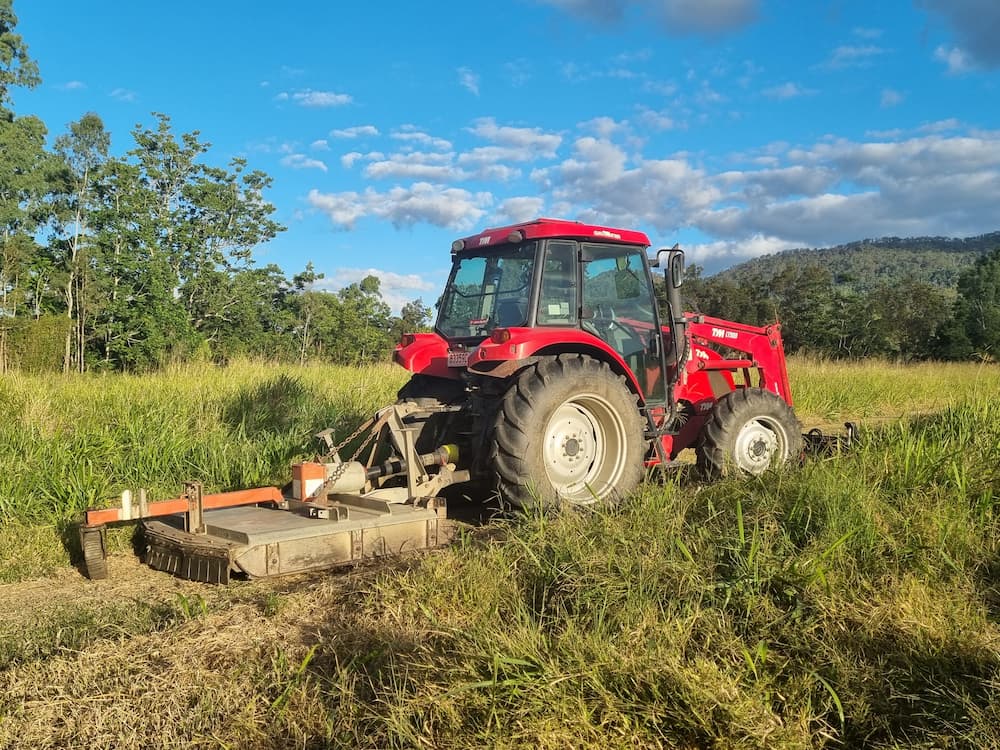 Slashing Grass Using Heavy Machinery — Jemal in Mackay, QLD