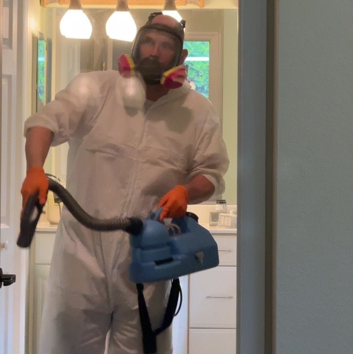 Man With White Suit And Mask — Southwest, FL — ProRemedy SWFL Man With White Suit And Mask — Southwest, FL — ProRemedy SWFL
