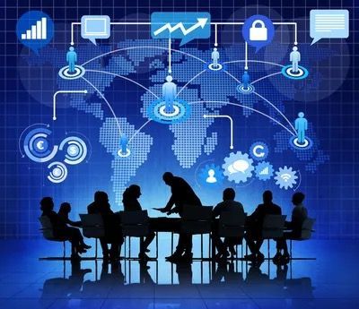 Two black vintage telephone handsets with cords against a gray background.