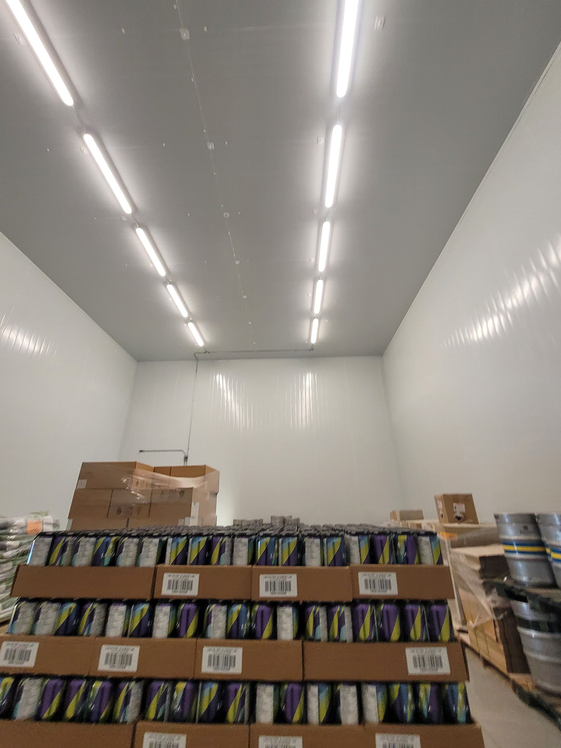 A warehouse filled with lots of cans and boxes
