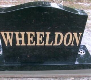 A Black Gravestone with The Name Wheeldon on It — Northern Rivers Headstones in Casino, NSW