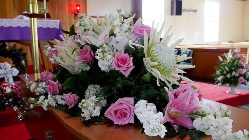 Bunch Of Flowers A Table In A Church — Northern Rivers Headstones in Kyogle, NSW