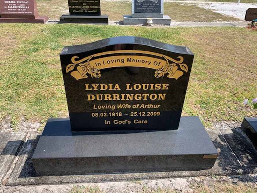 A Black Gravestone For Lydia Louise Durrington In A Cemetery — Northern Rivers Headstones in Casino NSW