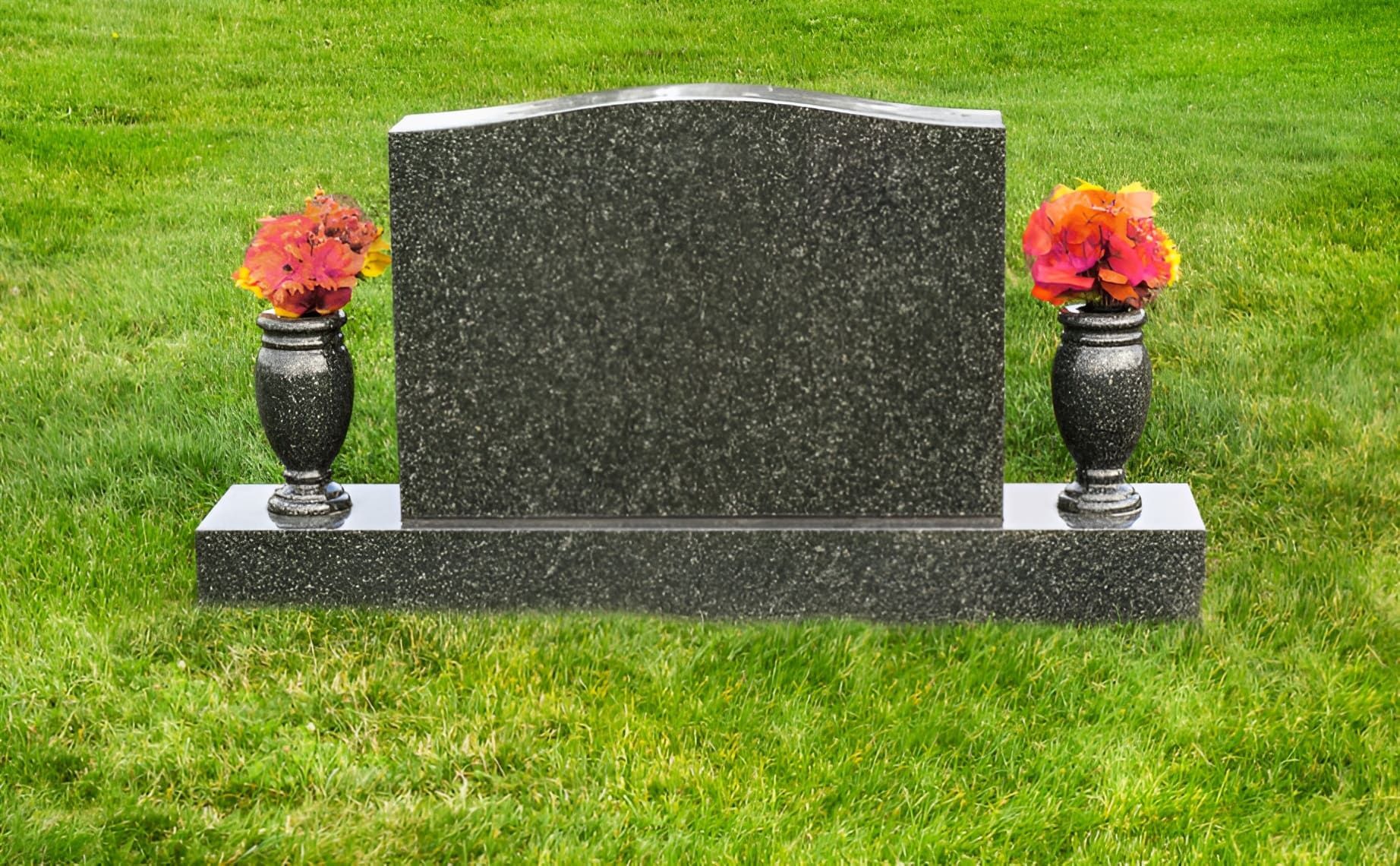 Granite headstone with flower vases in a Northern Rivers cemetery