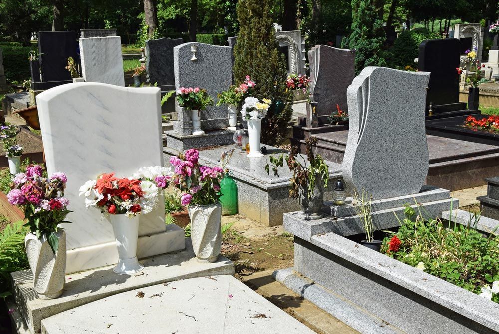 Restored Old Weathered Headstone In A Cemetery