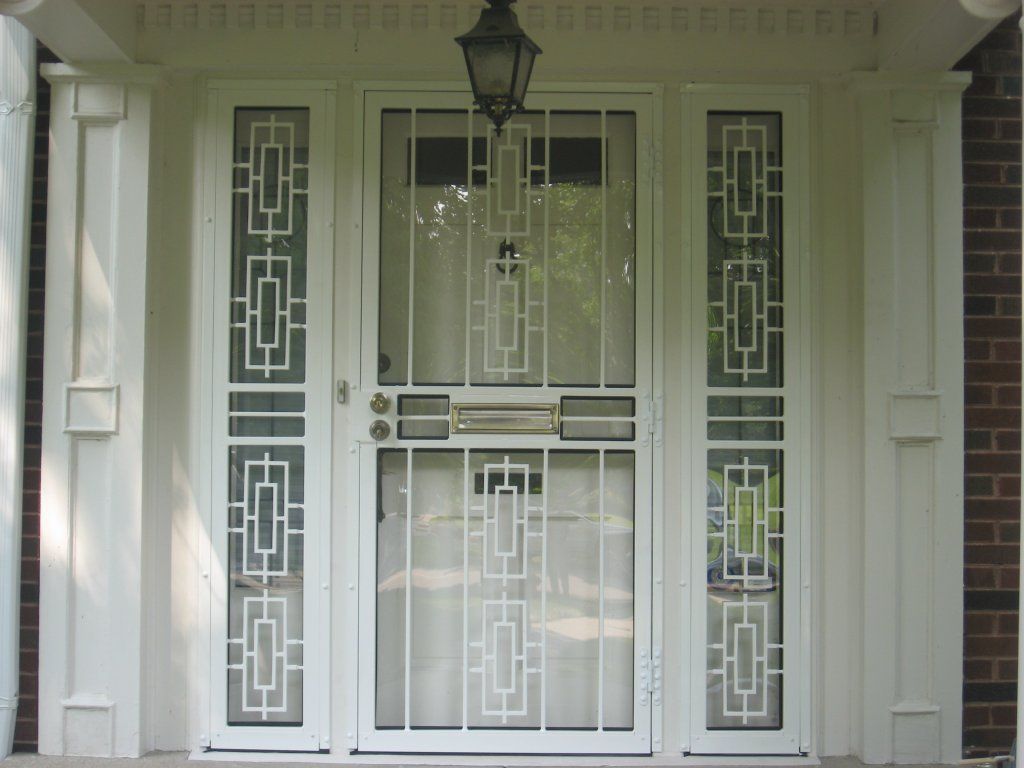 Woman Opening Security Grill - Indianapolis, IN - Markin Sales Camper & Security Doors