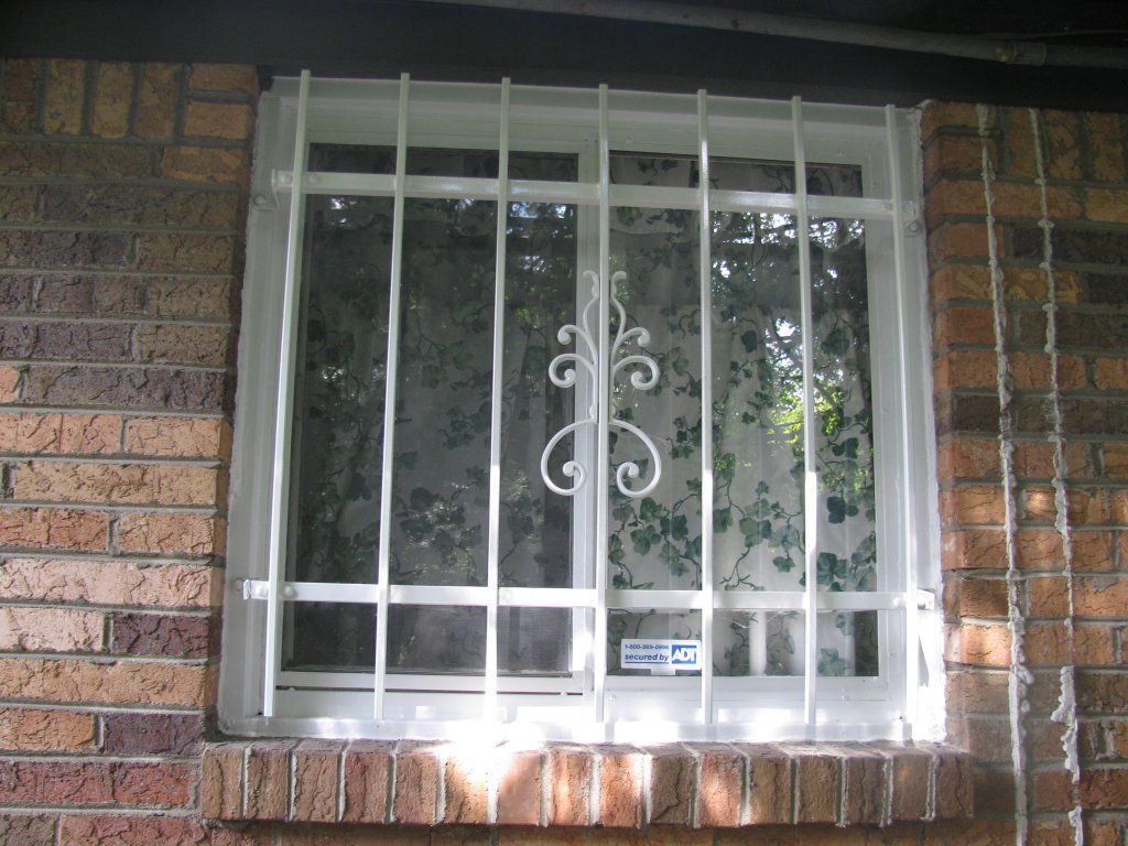 Window With Classic Decoration - Indianapolis, IN - Markin Sales Camper & Security Doors
