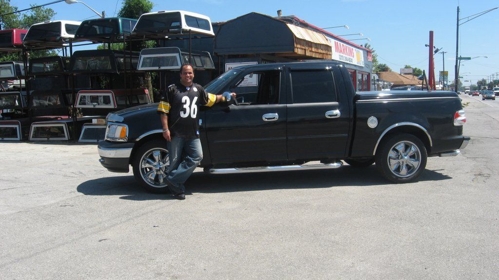 Black Pickup With Man - Indianapolis, IN - Markin Sales Camper & Security Doors