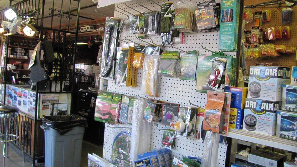 Picture Of Store With Trash Can - Indianapolis, IN - Markin Sales Camper & Security Doors