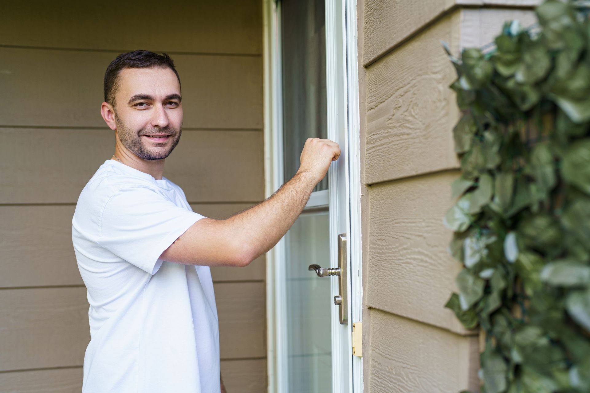 A man knocking on a door.