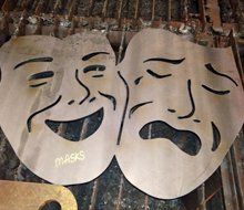 drama masks out of metal with our metal fabrication