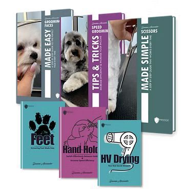 A collection of books about grooming a dog
