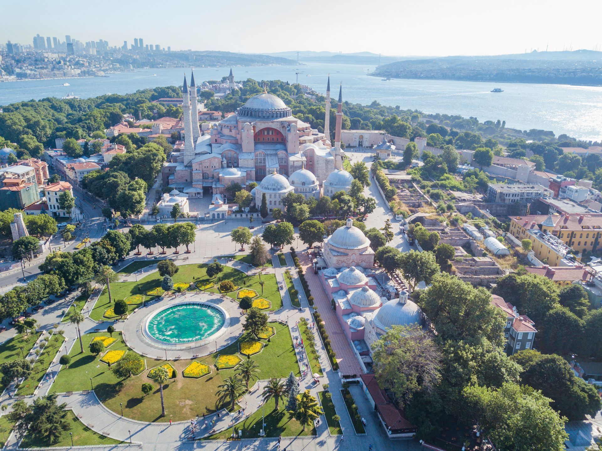 Panoramic view of Sultanahmet Square in Istanbul, featuring Hagia Sophia, the Blue Mosque, and visit