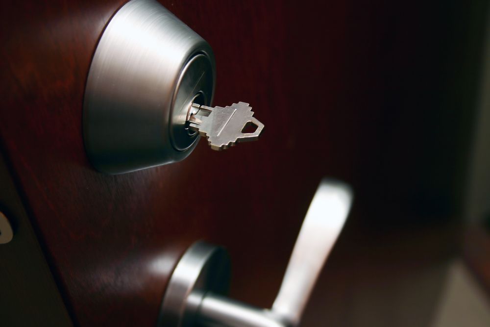 Close-up Of A Keyed Door Lock And Handle — Ulladulla Blinds & Home Improvements In Ulladulla, NSW