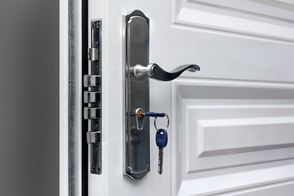 Close-up Of A Keyed Door Lock And Handle — Ulladulla Blinds & Home Improvements In Ulladulla, NSW