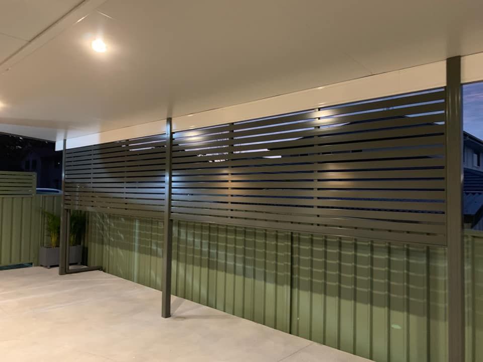 A Modern Slatted Fence, Providing Privacy To A Patio Area — Ulladulla Blinds & Home Improvements In Ulladulla, NSW