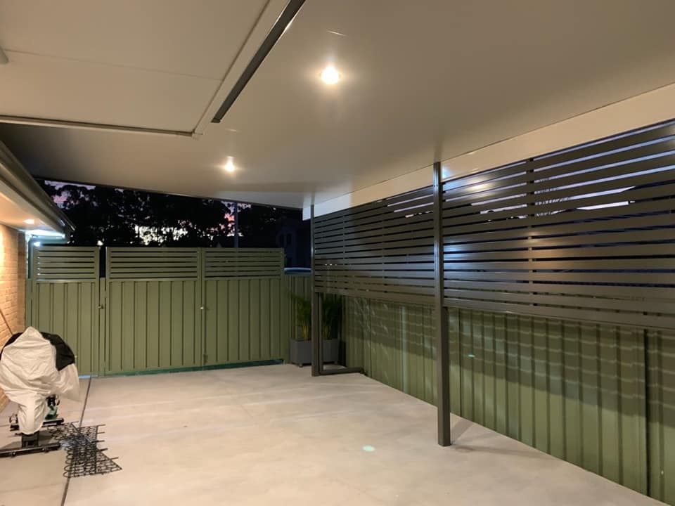 A Modern Slatted Fence, Creating A Secluded Outdoor Space — Ulladulla Blinds & Home Improvements In Ulladulla, NSW