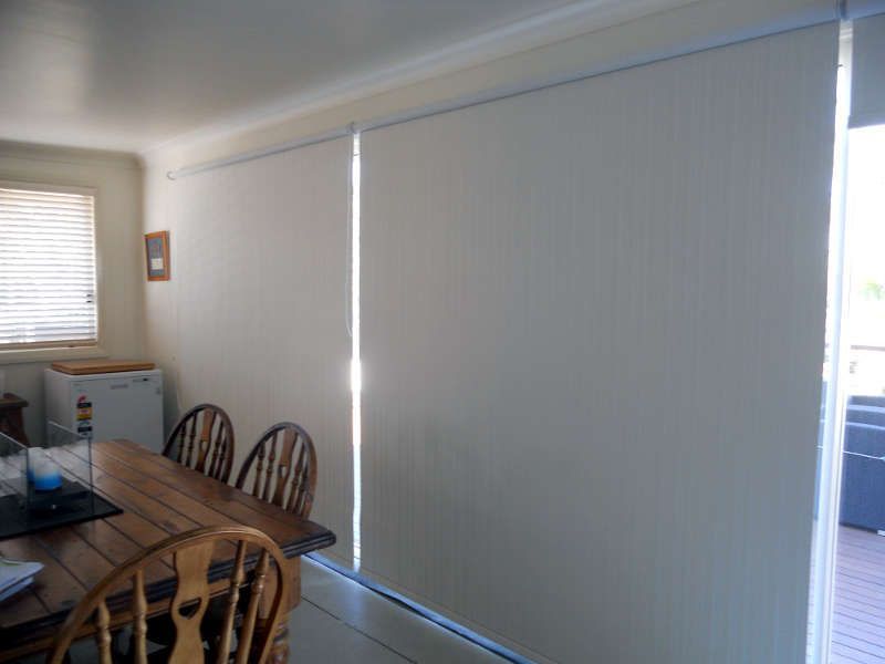 Roller Blinds Installed On A Large Window, Partially Rolled Up — Ulladulla Blinds & Home Improvements In Ulladulla, NSW