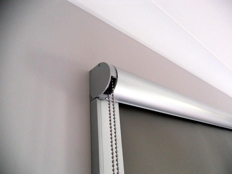 Close-up Of A Sleek Roller Blind With A Silver Cassette — Ulladulla Blinds & Home Improvements In Ulladulla, NSW