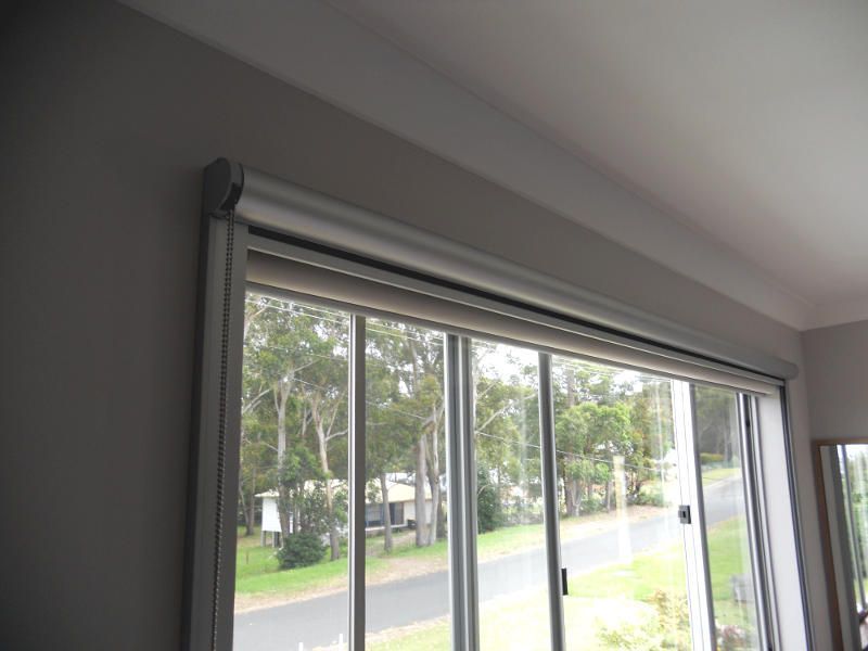 Roller Blinds On A Sliding Glass Door, Partially Open — Ulladulla Blinds & Home Improvements In Ulladulla, NSW