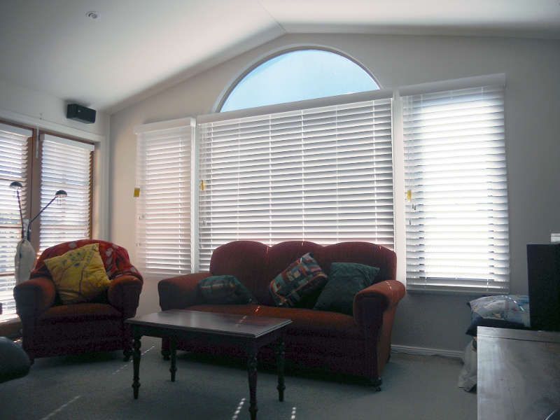 White Timber Venetians On An Arched Window, Adding A Touch Of Elegance — Ulladulla Blinds & Home Improvements In Ulladulla, NSW