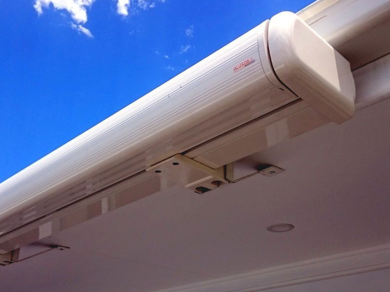 Close-up Of Retractable Awning Mechanism, Showing The Rollers And Arms — Ulladulla Blinds & Home Improvements In Ulladulla, NSW