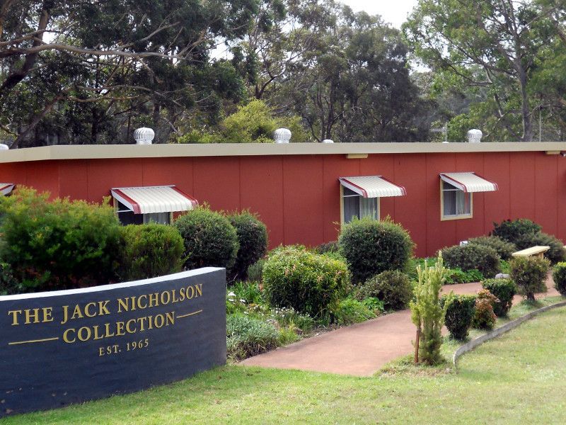 Multiple White Window Canopies On A Building, Offering Protection And Style — Ulladulla Blinds & Home Improvements In Ulladulla, NSW