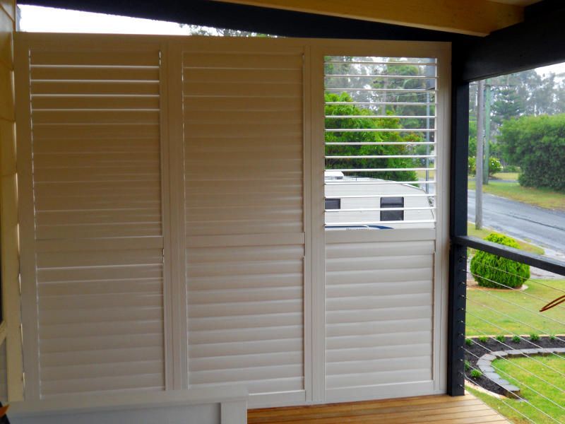 White Plantation Shutters, Open Position, On A Window — Ulladulla Blinds & Home Improvements In Ulladulla, NSW