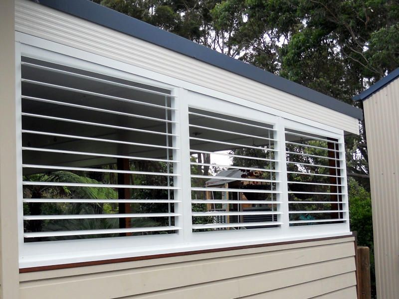 White Plantation Shutters, Partially Open, On A Large Window — Ulladulla Blinds & Home Improvements In Ulladulla, NSW