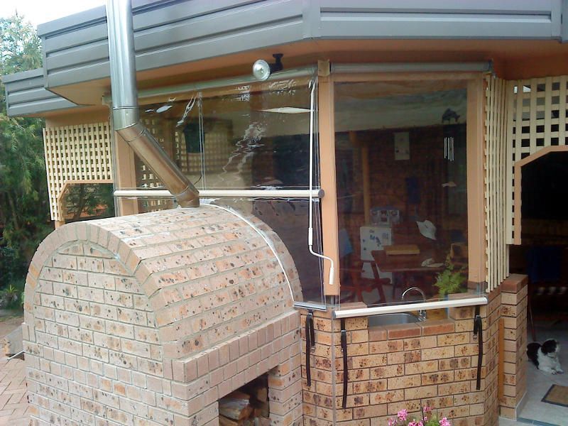 A Large Brick Oven Sits Outside Of A House — Ulladulla Blinds & Home Improvements In Ulladulla, NSW