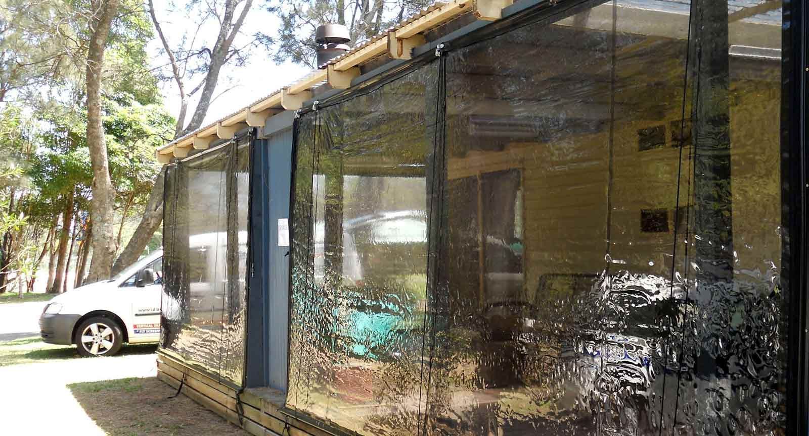 A Car Is Parked In Front Of A Shop — Ulladulla Blinds & Home Improvements In Ulladulla, NSW