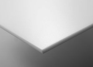 A close up of a white sheet of paper on a table.