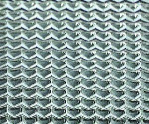 A close up of a metal mesh with a pattern on it.