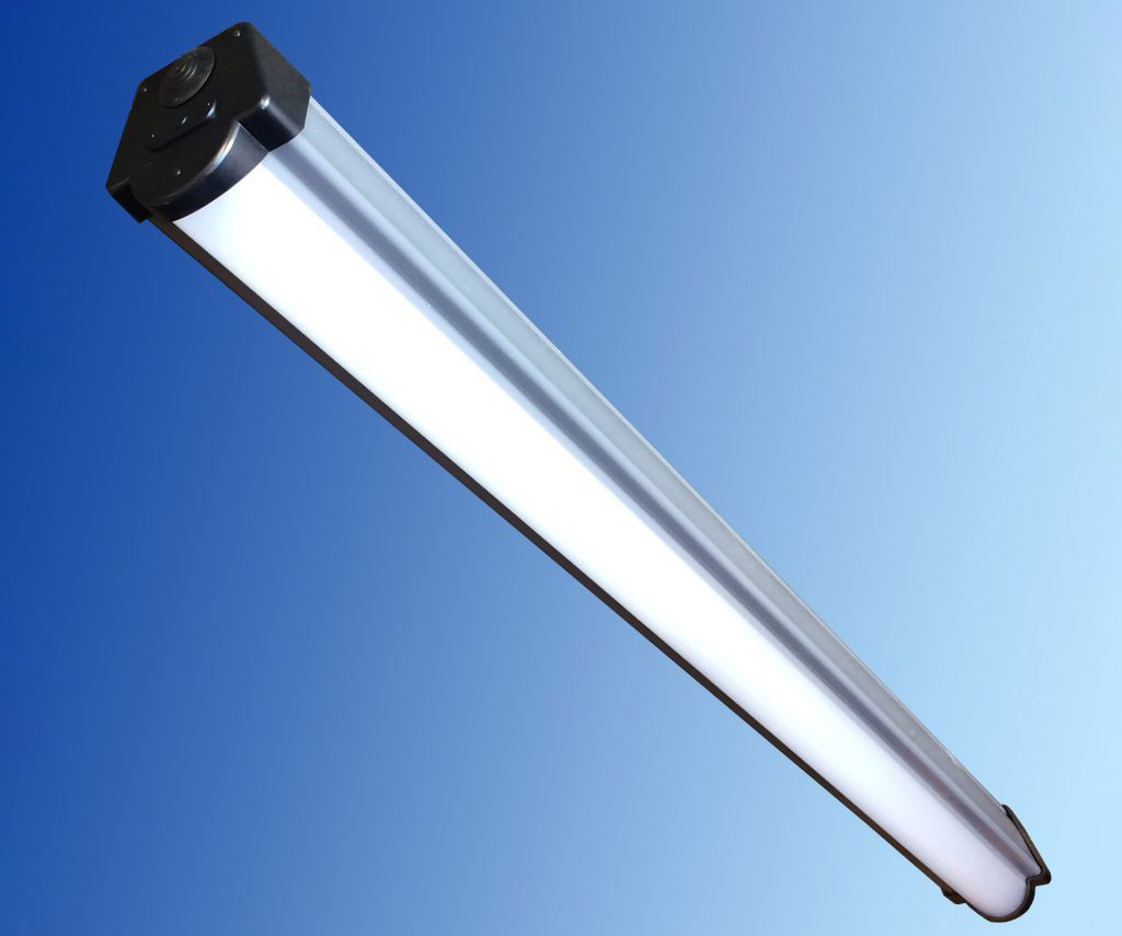 A very long light fixture with a blue background