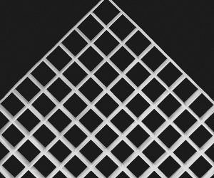 A close up of a white grid on a black background.