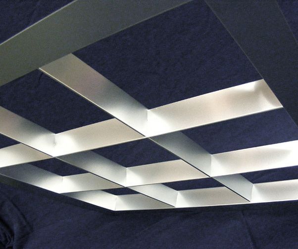 A ceiling with a grid of squares on it